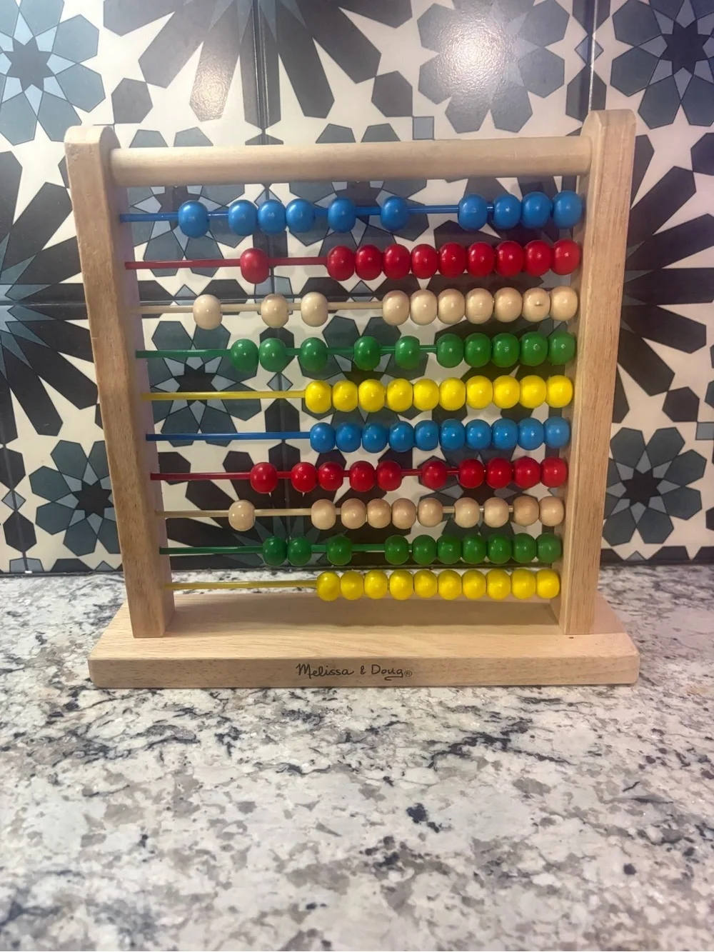 Melissa & Doug Wooden Counting Abacus in Red, Blue, Green, Yellow, Natural